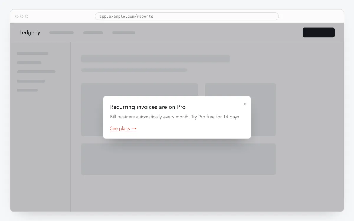 An upgrade prompt modal over a web app, with a benefit headline and a link button to the pricing page