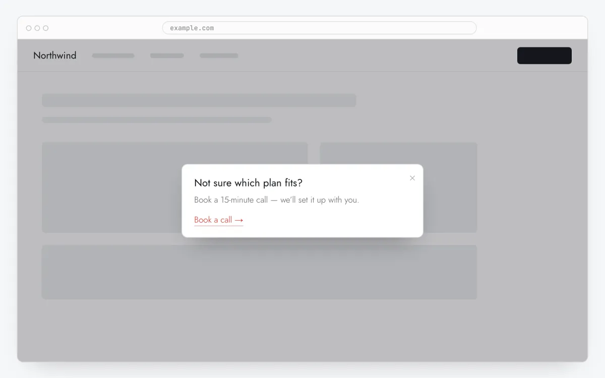 A popup (modal window) with a title, text and a link button over a website
